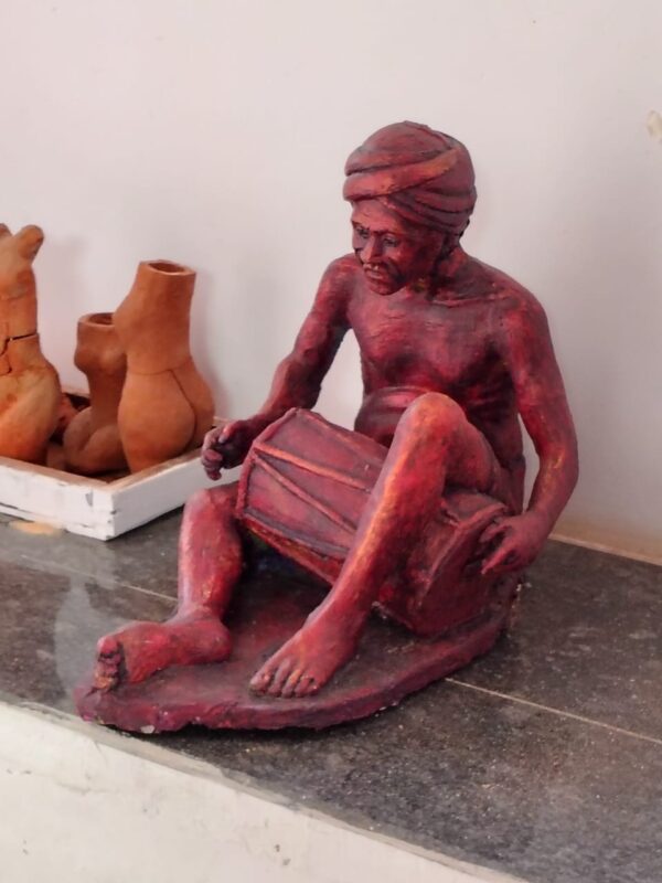 Traditional Folk Musician Sculpture